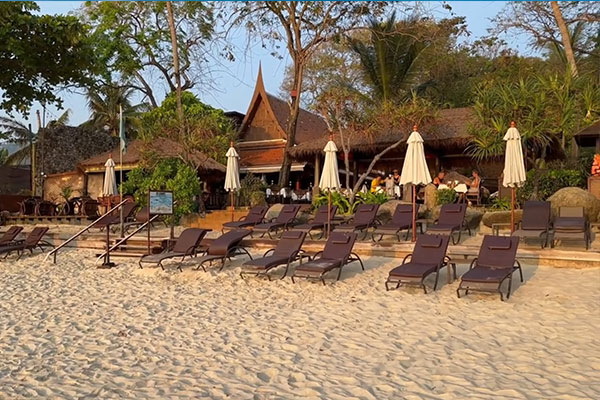 comfortable beach chairs on chaweng beach at anavana beach resort