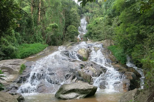 Na Muang Waterfall surrounded by tropical vegetation on Koh Samui